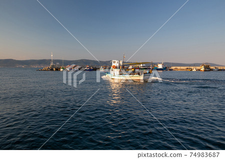 Pleasure boat ( touristic) in Nessebar(Bulgaria) - idyllic sunset Pleasure boat ( touristic) in Nessebar(Bulgaria) - idyllic sunset 74983687