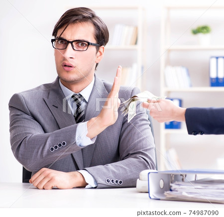 Businessmanbeing offered bribe for breaking law 74987090