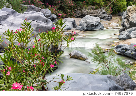 Long exposure image of Alcantara gorge in Sicily, Italy  74987879