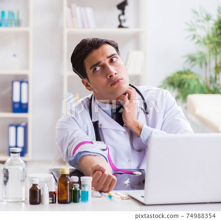 Doctor drug addict in the hospital Doctor drug addict in the hospital 74988354