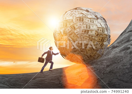 Businessman pushing away the dollar ball 74991240