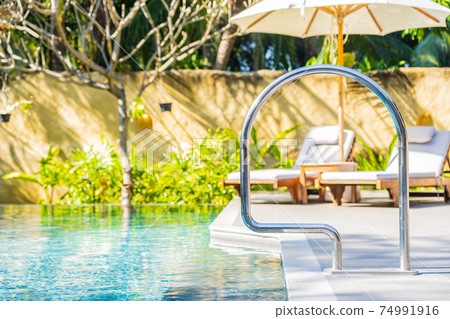 Stair around outdoor swimming pool 74991916