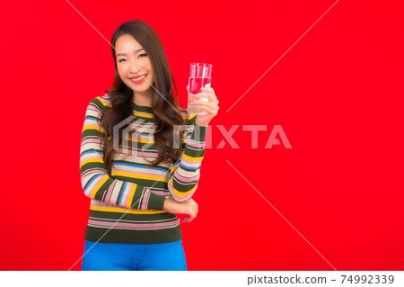 Portrait beautiful young asian woman with drinking water glass Portrait beautiful young asian woman with drinking water glass 74992339