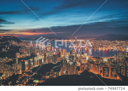 Aerial view of Hong Kong City at sunset. Vintage tone 74997724