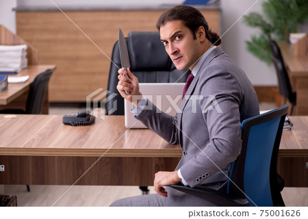 Young businessman employee in bullying concept in the office Young businessman employee in bullying concept in the office 75001626