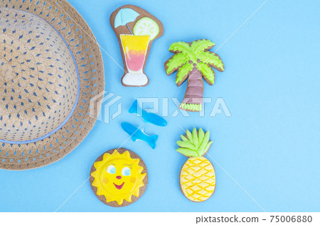Homemade cookies with summer theme on blue background. 75006880