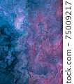 Beautiful abstract background. Pouring acrylic paint on canvas. 75009217
