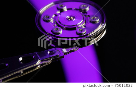 Computer hard drive reading head. Opened hard disk from personal computer 75011022