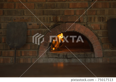 A traditional brick oven for cooking and baking. 75017513