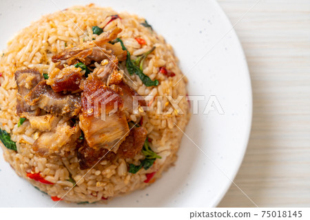 fried rice with Thai basil and crispy belly pork 75018145