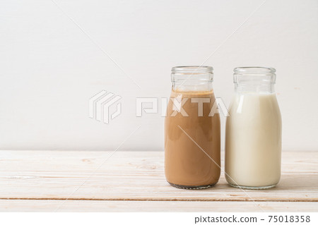 coffee and fresh milk in bottle coffee and fresh milk in bottle 75018358