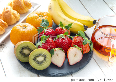 Fruit breakfast image on a stone plate Fruit breakfast image on a stone plate 75019662