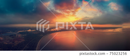 Sunset over the sea 75023256