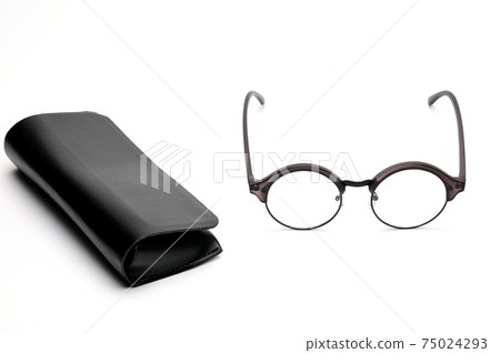 Optical eyeglasses on a white background. Optical eyeglasses on a white background. 75024293