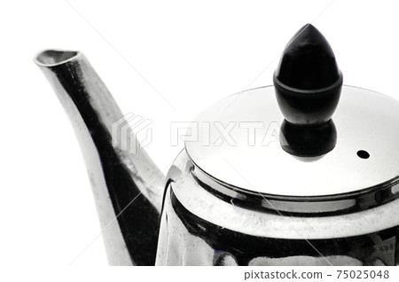 Vintage silver teapot on a white background Vintage silver teapot on a white background 75025048