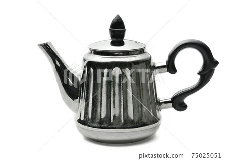 Vintage silver teapot on a white background Vintage silver teapot on a white background 75025051