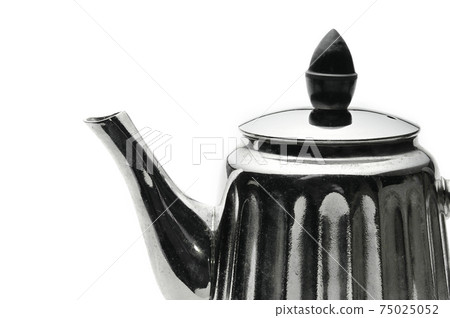 Vintage silver teapot on a white background Vintage silver teapot on a white background 75025052