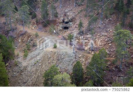 Abandoned mine in mountains 75025862