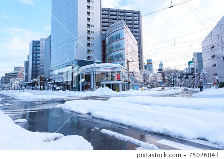 In front of Toyama station in winter and snow 75026041