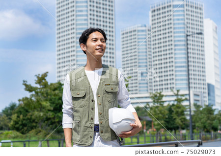 Young man working in the construction industry Young man working in the construction industry 75029073