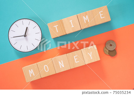 Time is money | Blocks with blocks, clocks and coins with "TIME" and "MONEY" written on them 75035234