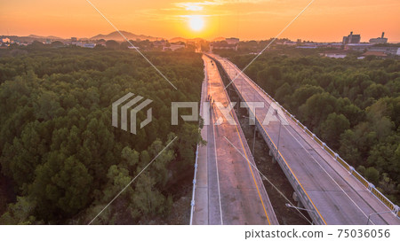 The sun rises over Thepsrisin Bridge. Thepsrisin Bridge is a shortcut to connect the city from Saphan Hin intersection with Sakdidet intersection in order to reduce the bad traffic congestion. The sun rises over Thepsrisin Bridge. Thepsrisin Bridge is a shortcut to connect the city from Saphan Hin intersection with Sakdidet intersection in order to reduce the bad traffic congestion. 75036056