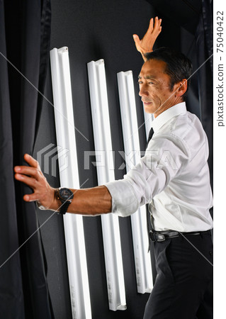 Japanese businessman, muscular middle-aged man, image of a fighting man 75040422