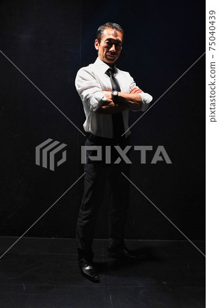 Japanese businessman, muscular middle-aged man, image of a fighting man 75040439