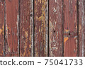 Rusty old wooden garage door painted in red texture rural street poor neighborhood in Sofia, Bulgaria, Eastern Europe 75041733