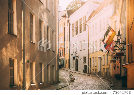 Tallinn, Estonia. Empty Puhavaimu Street In Old Town During Sunset. Motorcycle Parked On Old Street 75041768