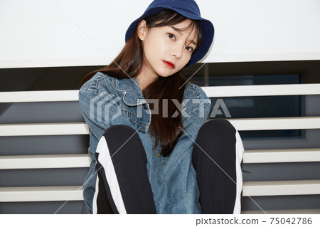 Young woman street fashion portrait 75042786