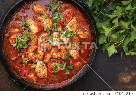 Creole cajun court bouillon with fish and seafood gumbo chowder stew Creole cajun court bouillon with fish and seafood gumbo chowder stew 75043210