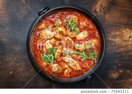 Creole cajun court bouillon with fish and seafood gumbo chowder stew Creole cajun court bouillon with fish and seafood gumbo chowder stew 75043211