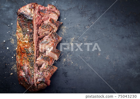 Traditional barbecue aged saddle of venison marinated Traditional barbecue aged saddle of venison marinated 75043230