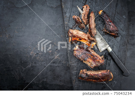 barbecue spare ribs baby back cut with hot honey chili marinade  75043234