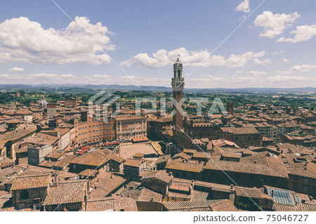 Panoramic view of Siena city with Piazza del Campo and the Torre del Mangia Panoramic view of Siena city with Piazza del Campo and the Torre del Mangia 75046727