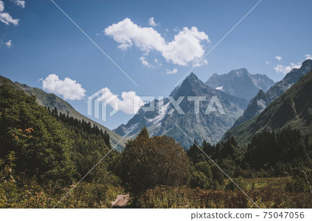 Panorama view on mountains scene and away waterfall in national park of Domba Panorama view on mountains scene and away waterfall in national park of Domba 75047056