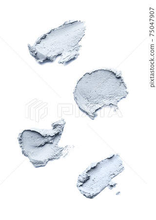 Smears of cosmetic clay on a white background. Smears of cosmetic clay on a white background. 75047907