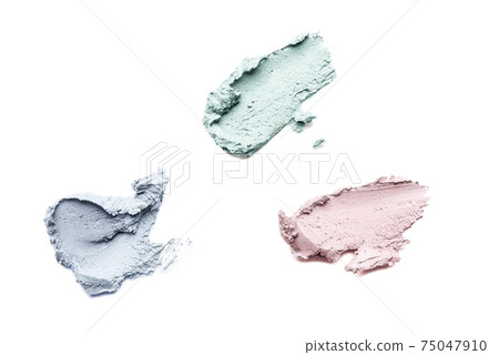 Smears of cosmetic clay on a white background. Smears of cosmetic clay on a white background. 75047910