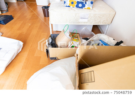 A messy room preparing to move A messy room preparing to move 75048759