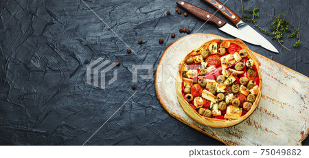 Cheese pie with peppers and olives. Cheese pie with peppers and olives. 75049882