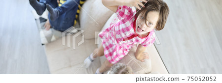 Children play and jump on couch and have fun. Children play and jump on couch and have fun. 75052052
