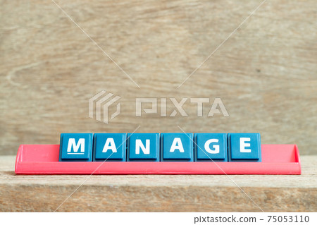 Tile alphabet letter with word manage in red color rack on wood background 75053110