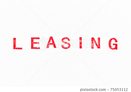 Red color ink rubber stamp in word leasing on white paper background 75053112