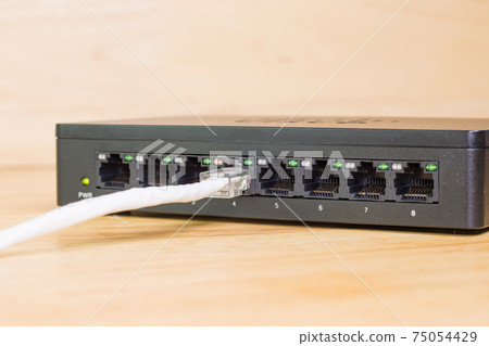 white cables to connect Lan port concept Communication connection technology 75054429