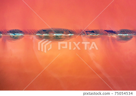 Abstract view of pink lake salt water from drone 75054534