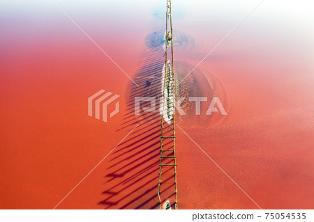 Abstract view of pink lake salt water from drone 75054535