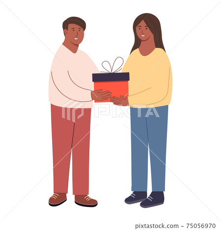 happy people. Give each other gifts. A woman gives a man a gift. The guy gives the girl a present. Holiday surprise. Celebrating Christmas. Charity. Couples giving and holding presents. 75056970