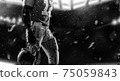 Sportsman with ball in helmet on stadium in action. Sport wallpaper. Team sports. 75059843