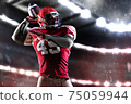 Portrait of confident American football player 75059944